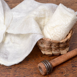 Stretched Raw Silk Cocoons in woven basket