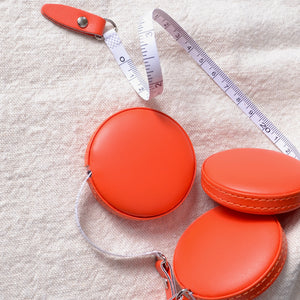 Retractable measuring tape, orange